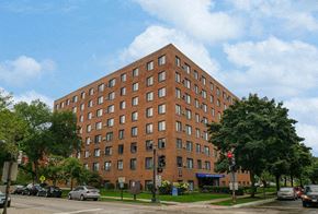 Evanston apartment for rent - a tall brick building sitting on the corner of a street