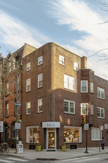 Philadelphia apartment for rent - a brick building on the corner of a city street