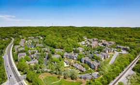 Nashville apartment for rent - an aerial view of a neighborhood with houses and trees