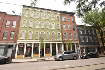Cincinnati apartment for rent - a row of buildings on a city street
