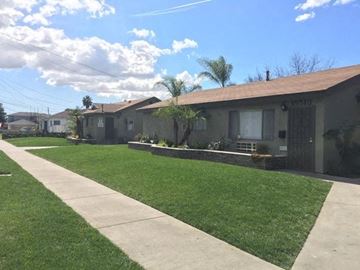 Bellflower apartment for rent - a house with a lawn and a sidewalk