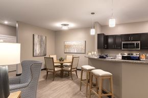 Shiloh apartment for rent - dining table and bar stools at Thirteen01 at Hartman Lakes, Shiloh, IL, 62269