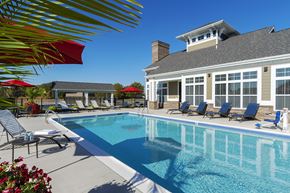 Shiloh apartment for rent - pool with building in background at Thirteen01 at Hartman Lakes, Shiloh, 62269