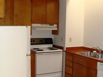 Santa Rosa apartment for rent - a kitchen with a stove and a refrigerator