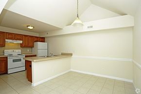 Shelby Twp apartment for rent - a kitchen with an island and a stove and a refrigerator