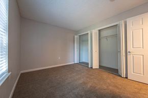 South Lake Tahoe apartment for rent - a bedroom with a closet and a door to a closet