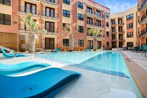 San Antonio apartment for rent - a swimming pool in front of an apartment building