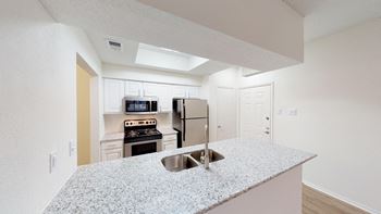 Designer upgrade apartment homes include: granite countertops, stainless steel appliance package, brushed nickel lighting & hardware, upgraded faux-wood flooring & carpet and framed bathroom mirrors