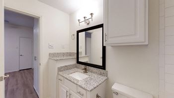 Designer upgrade apartment homes include: granite countertops, stainless steel appliance package, brushed nickel lighting & hardware, upgraded faux-wood flooring & carpet and framed bathroom mirrors