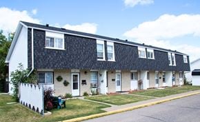Brandon townhouse for rent - a house with a slate roof on the side of a street