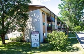 Brandon apartment for rent - an apartment building with a sign in front of it