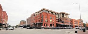 Lincoln apartment for rent - a large red brick building on the corner of a city street