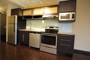Lincoln apartment for rent - a kitchen with a stove and a refrigerator
