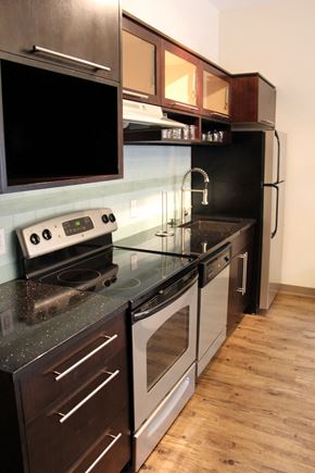 Lincoln apartment for rent - a kitchen with a stove and a sink