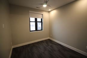 Lincoln apartment for rent - a living room with wood floors and a window