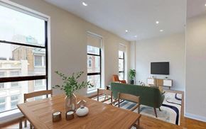 Philadelphia apartment for rent - A dining room with a wooden table and chairs.