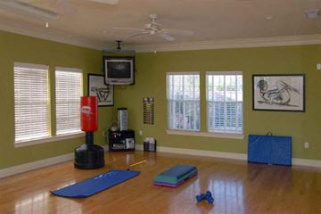 Biloxi apartment for rent - a living room with yoga mats on the floor