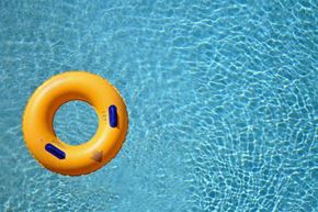 Biloxi apartment for rent - a yellow swimming ring in a swimming pool