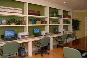 Biloxi apartment for rent - a room with desks with computers and chairs