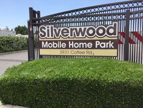 Modesto apartment for rent - a sign park in front of a gate