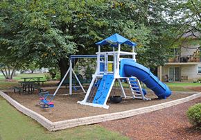 Lancaster apartment for rent - a playground with a blue slide and a swing