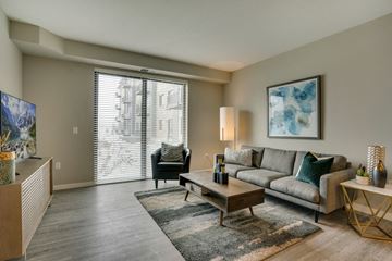 Eagan apartment for rent - a living room with a couch and a coffee table