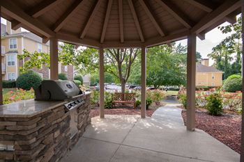 Outdoor grill with intimate seating area