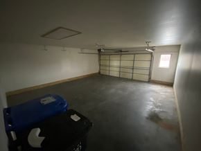 Fargo apartment for rent - A room with a blue and black storage box on the floor.