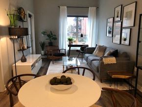Saint Louis apartment for rent - a living room with a table and a couch