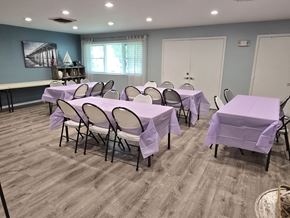 Mechanicsville apartment for rent - A room with tables and chairs set up for an event.