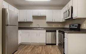 Ridgeland apartment for rent - Spacious Kitchen with Pantry Cabinet at Ridgeland Place Apartment Homes, Ridgeland, MS, 39157