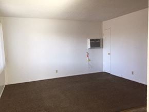 Modesto apartment for rent - an empty living room with white walls and a white door