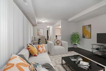 Forestville apartment for rent - a living room with two couches and a tv