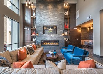 Media lounge with plush seating and tvs