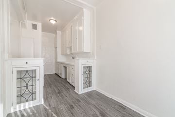 Los Angeles apartment for rent - a white kitchen with white cabinets and a window