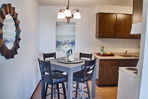 Hopkins multi-family for rent - Dining And Kitchen at Knollwood Towers West  Apartments, Hopkins