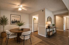 Nashville apartment for rent - A dining room with a round table and chairs.