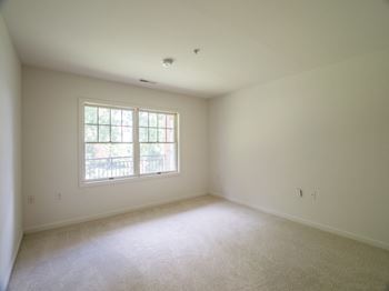 Wall-to-wall carpet (check for flooring specifics)