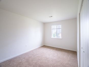Wall-to-wall carpet (check for flooring specifics)