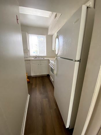 Wood-grain vinyl plank (check for flooring specifics)