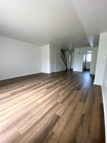 Wood-grain vinyl plank (check for flooring specifics)