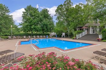 Heated outdoor swimming pool with sundeck