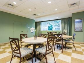 Miami apartment for rent - a dining room with tables and chairs