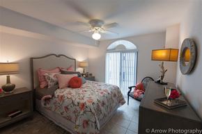 Miami apartment for rent - a bedroom with a bed and a ceiling fan
