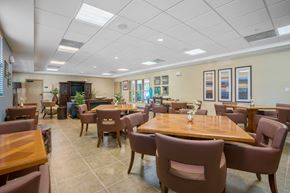 Miami apartment for rent - a dining room with tables and chairs in a restaurant