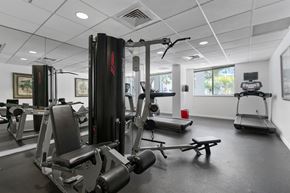 Miami apartment for rent - a gym with weights and other exercise equipment in a building