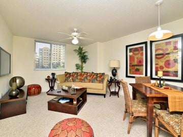 Miami apartment for rent - a living room with a couch and a table