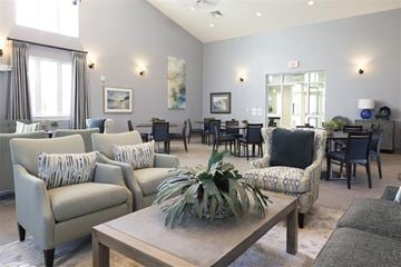 Medfield apartment for rent - a living room with couches and chairs and a table