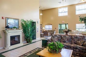 Barrington apartment for rent - a living room with a fireplace and a couch