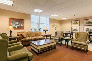 Newport apartment for rent - a living room with couches and chairs and a table